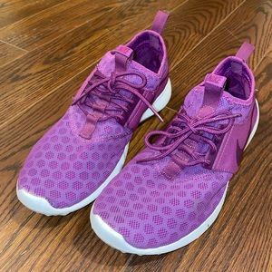 two pairs of nike shoes